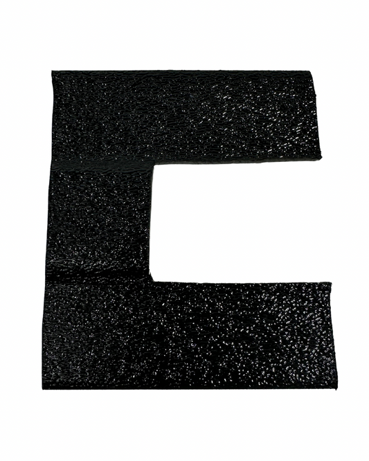 Black textured letter 'E' on a white background
