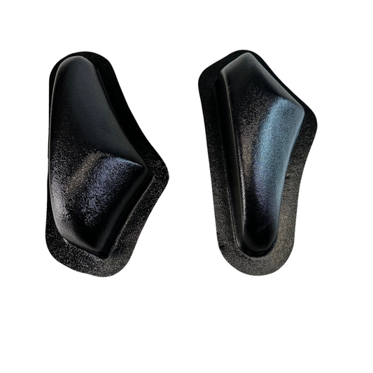 Two black shoe inserts on a white background