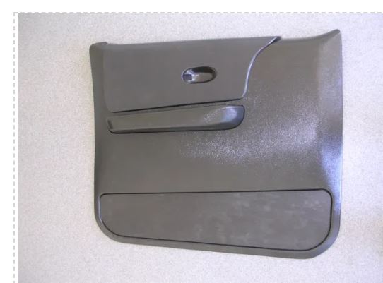 Gray car door panel on a light gray background