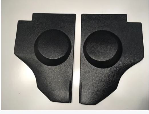 A pair of black kick panels for 1953-1955 Ford trucks, featuring cutouts for 6.5-inch speaker pods.