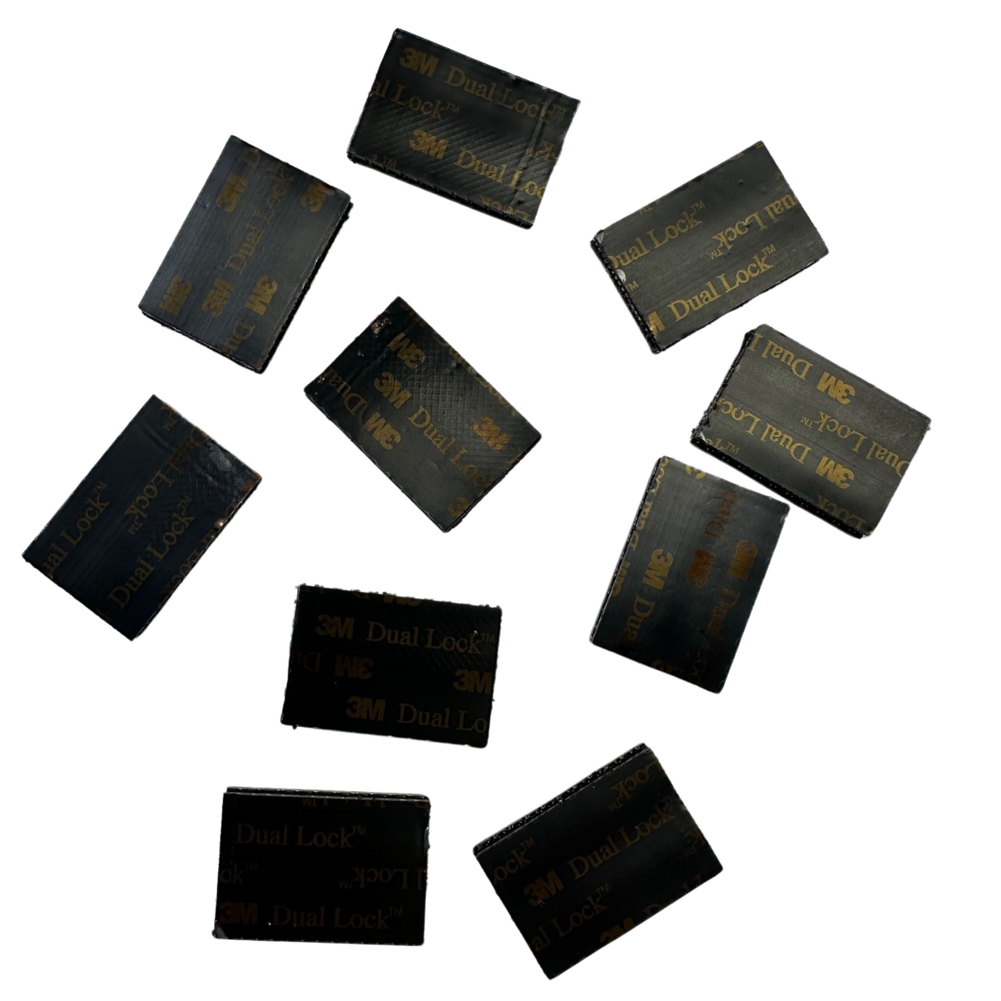 Dual lock tabs spread out showing individual black rectangular tab detail — 30 count pack for custom interior panel mounting