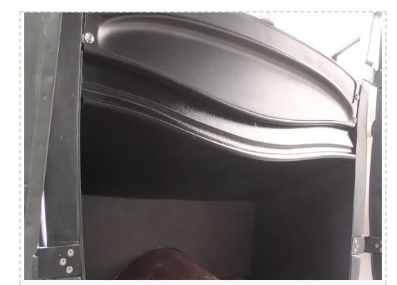 Contoured under dash panel for 1931-1934 Ford vehicles, primarily black in color.