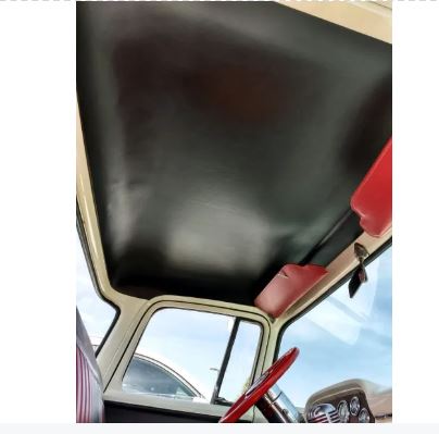 Black rubberless headliner installed inside the cab of a vintage Ford truck