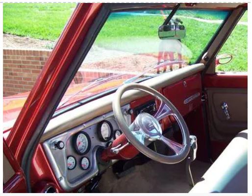 Interior view of a 1967-1972 Chevrolet Truck featuring the steering wheel and dashboard with pillar covers.