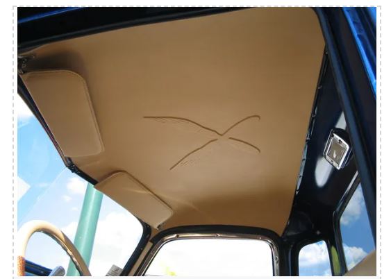 A customer installed, beige, smooth ABS headliner for 1947–1953 Chevrolet Advance Design truck with integrated front and rear mounting clips