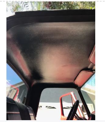 Car interior with a sunlit windshield