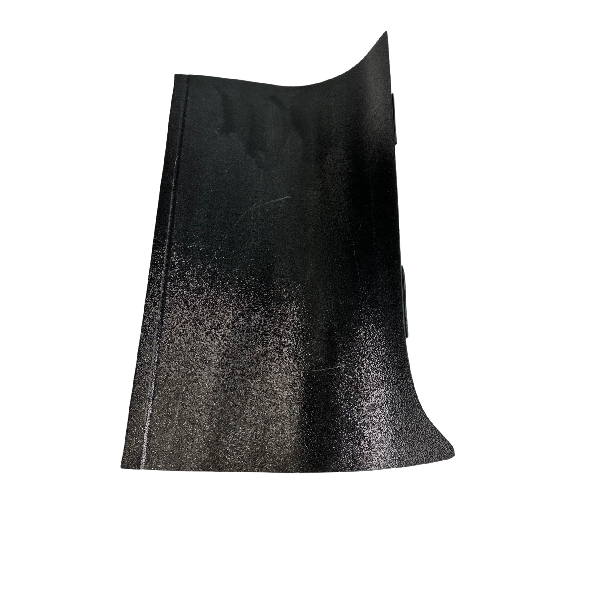 Black leather pillow on a white background