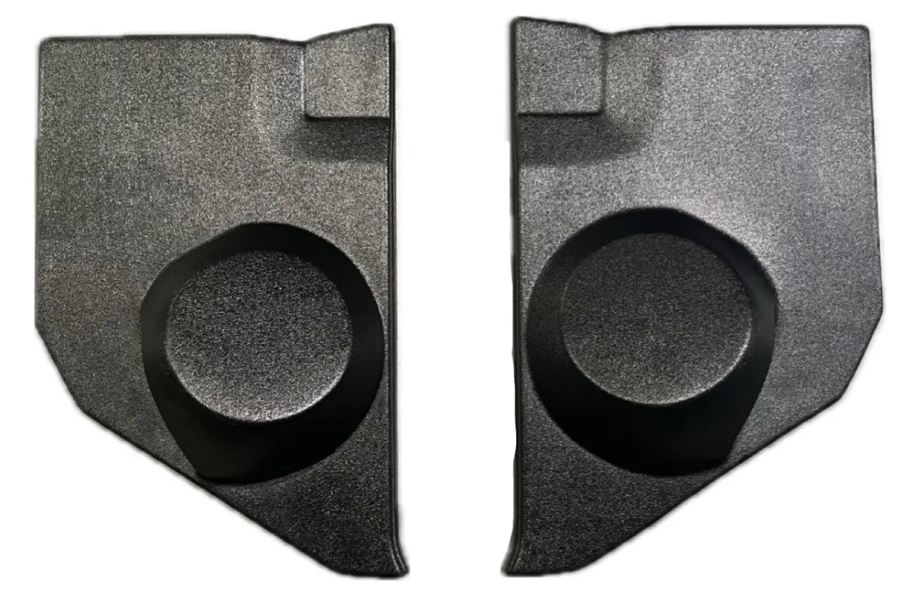 A pair of black kick panels for Ford trucks, featuring integrated speaker pods.