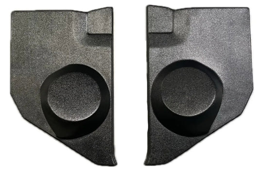 A pair of black kick panels for Ford trucks, featuring integrated speaker pods.