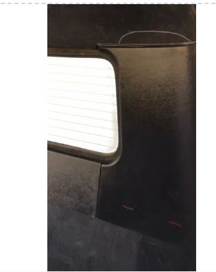 Close-up of a corner panel in a 1955-59 Chevrolet small window truck