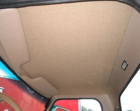 Installed beige ABS molded headliner for 1967–1972 Ford F-Series truck, seam‑free design, made in the USA.