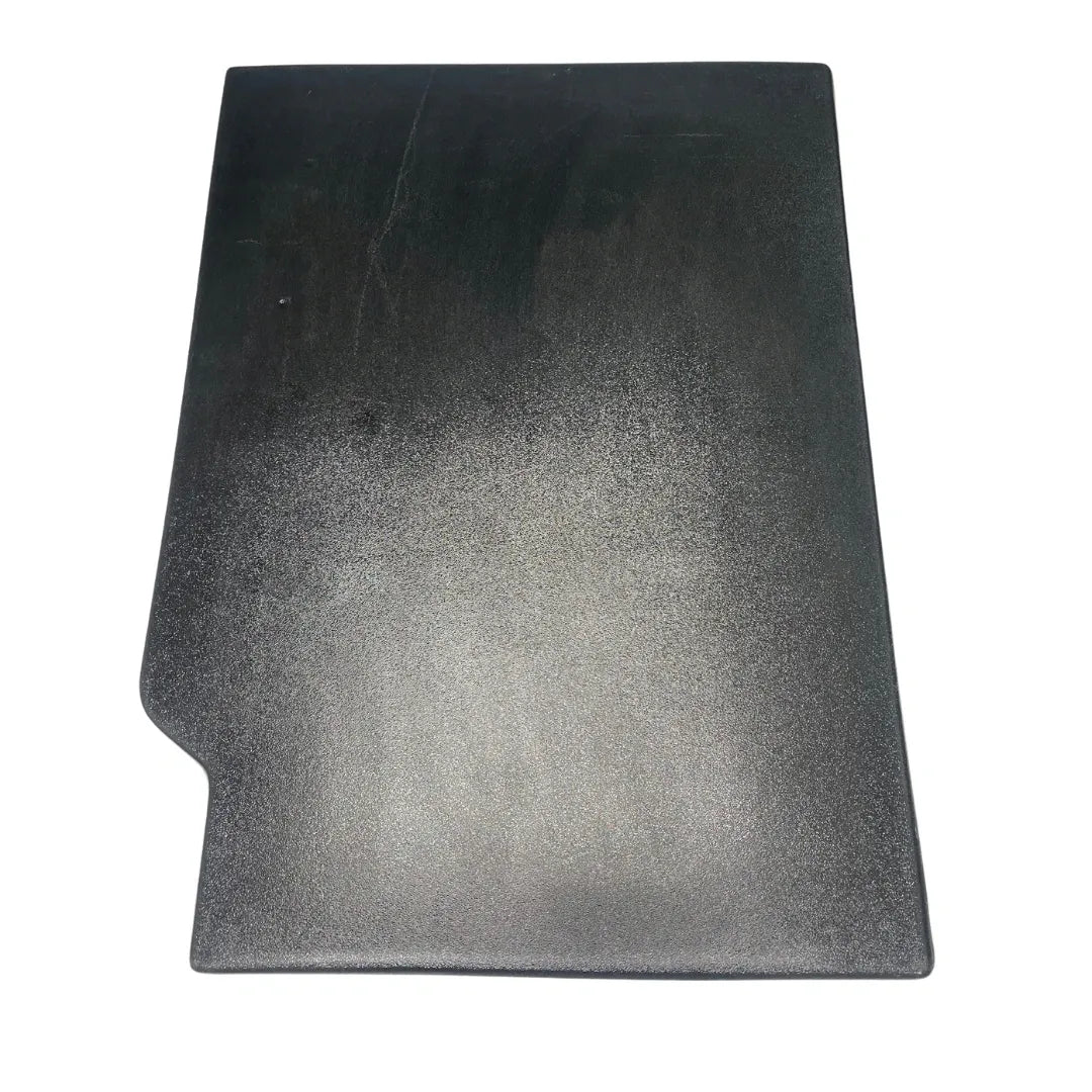 Black smooth door panel for a Ford truck, without armrests.
