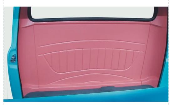 Rear cab cover of a blue 1953-1956 Ford Truck with a smooth, solid pink color finish.