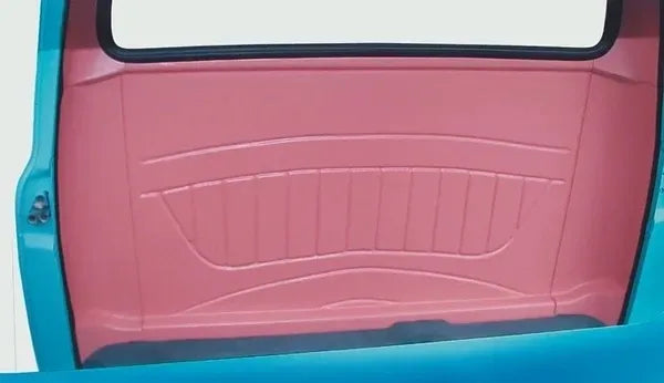 Car interior with pink door panel and blue exterior