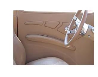 Beige car interior with steering wheel on a white background