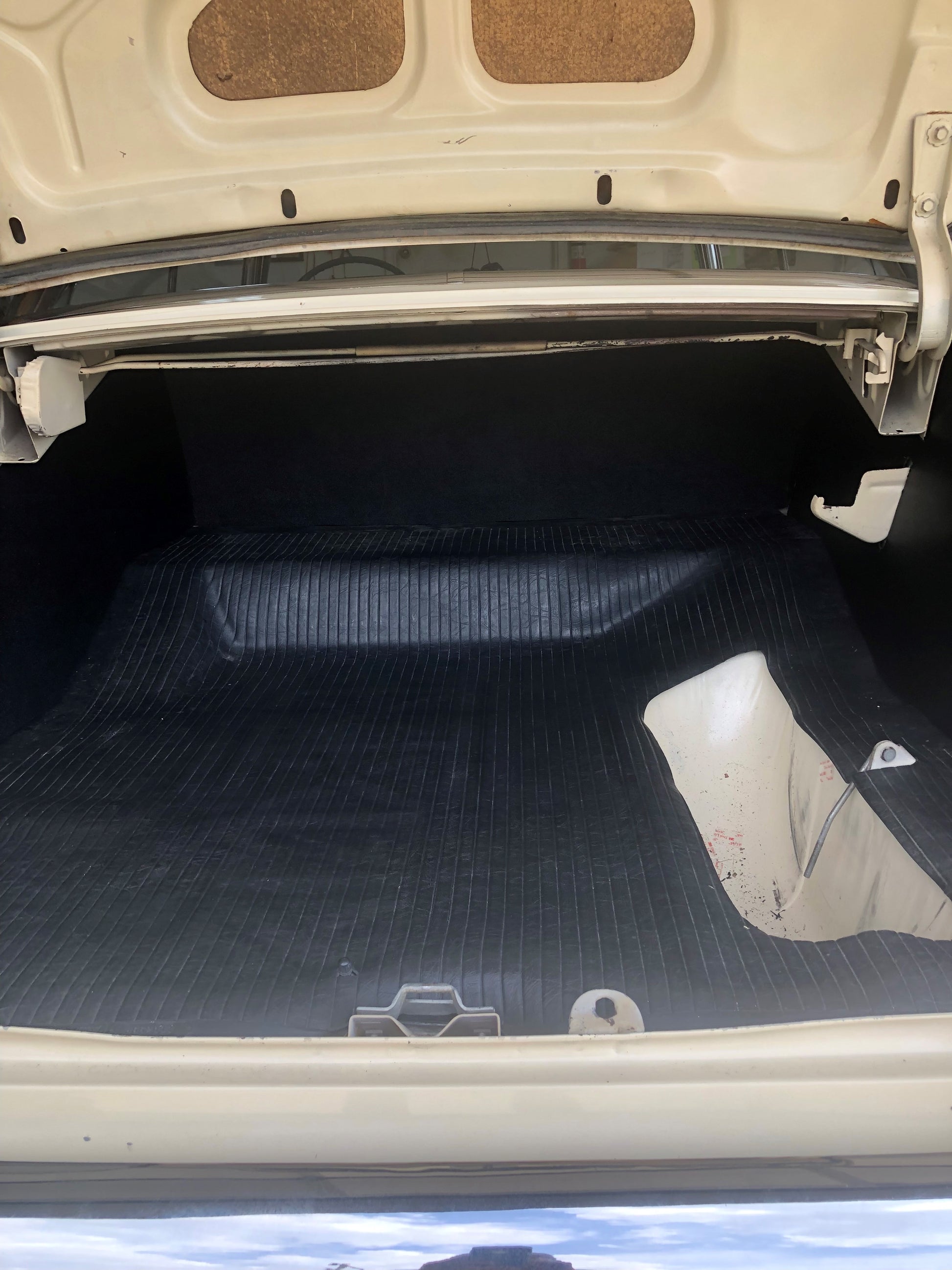 Full trunk interior of a 1955–1957 Chevrolet Hard Top with the RD3312 ABS trunk panels installed.
