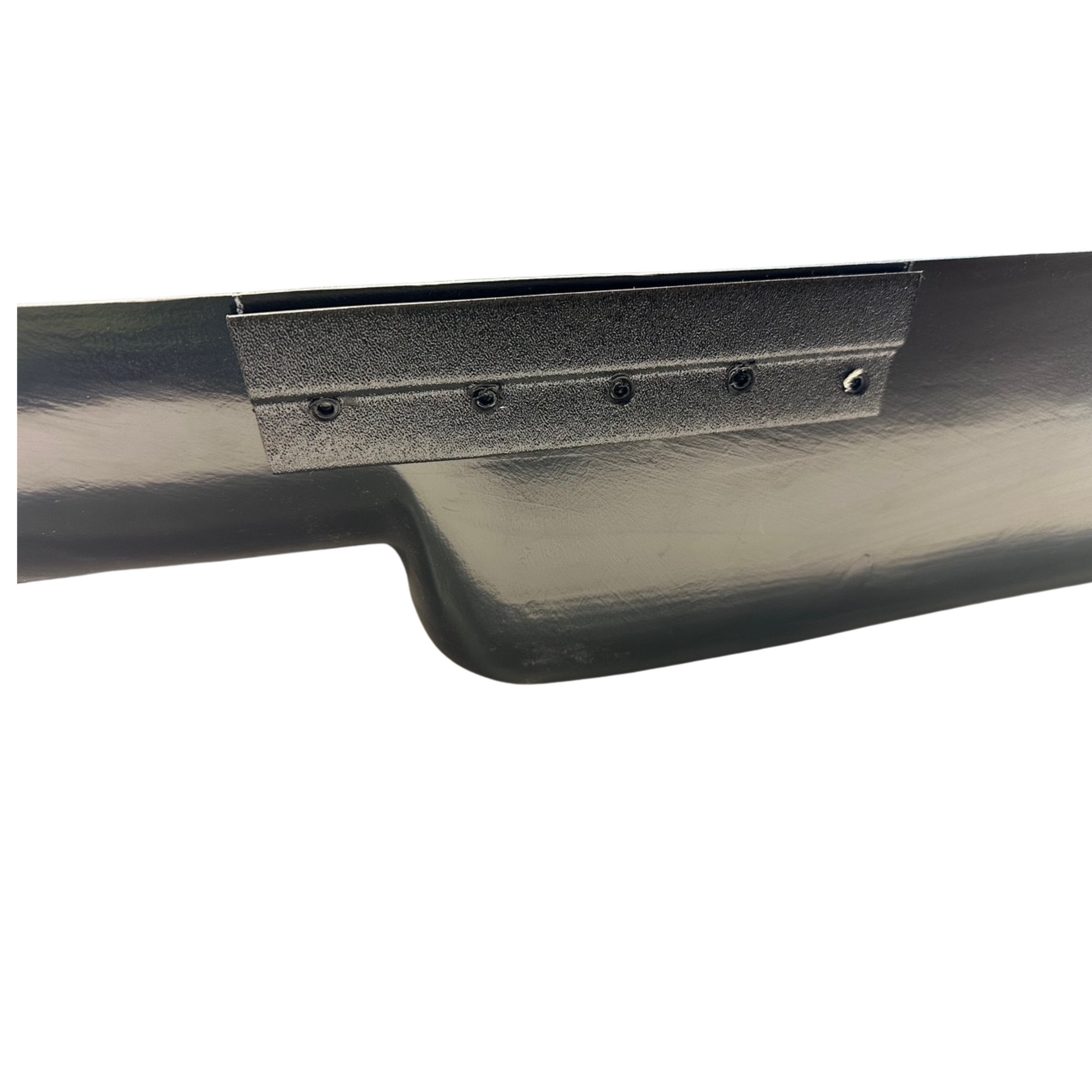 Close-up of a metal exhaust pipe with a white background
