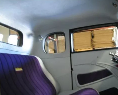 Interior of a vehicle showing 1932 Ford 3‑ or 5‑window coupe molded ABS trim‑to‑fit headliner with quarter panels