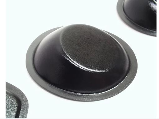 A black, round, universal speaker pod with a recessed mount design.