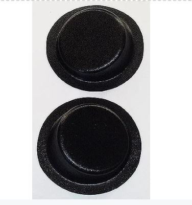 Two black round objects on a white background
