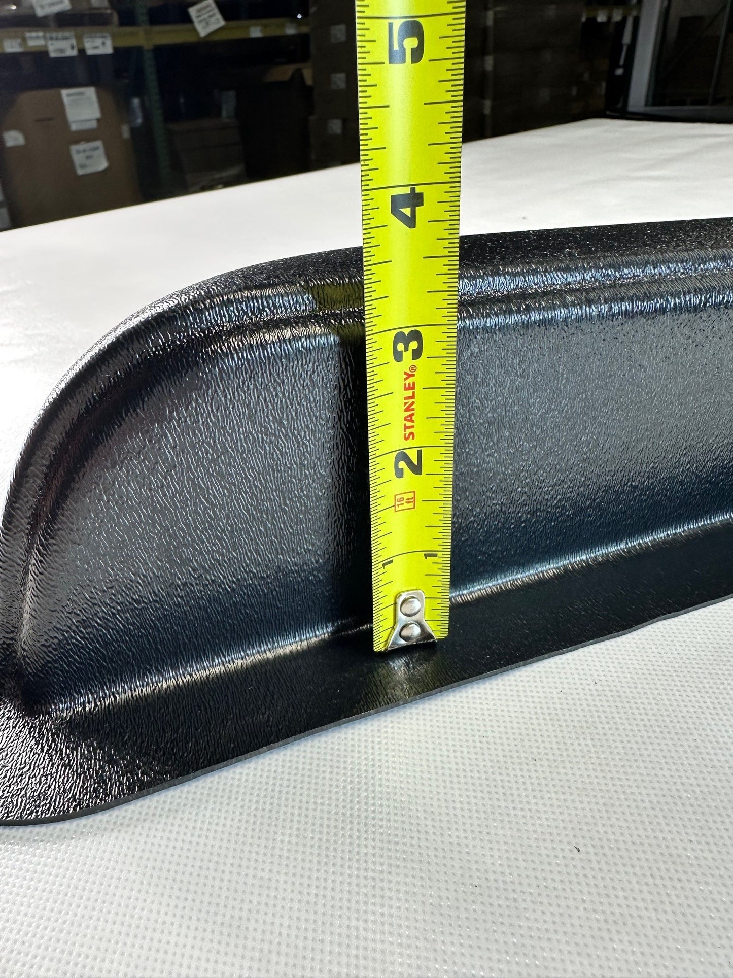 Black Rod Doors universal modular Fresno‑style armrest, 3.5 inches depth with a measuring tape indicating dimensions on a white surface.