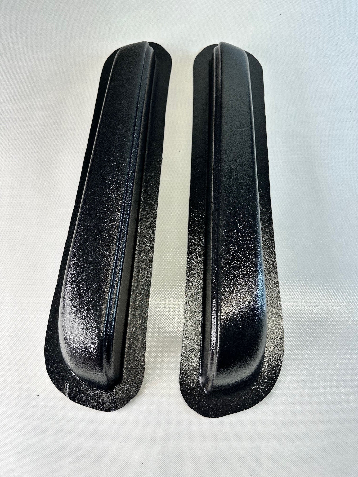 Two black Rod Doors universal modular Fresno‑style armrests, 19.5 inches long, sold as a pair