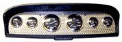 Vintage car dashboard with five round gauges set against a textured metal background, conveying a classic and nostalgic automotive feel.
